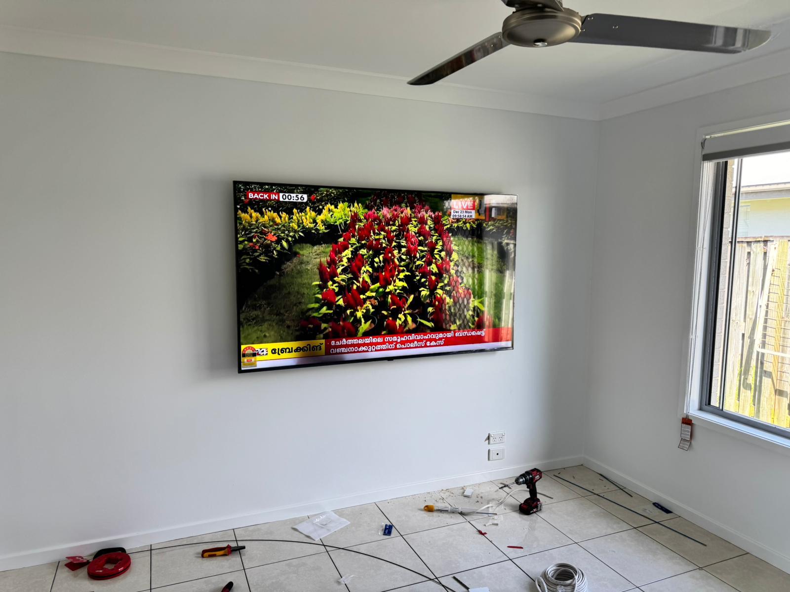 Finished wall-mounted television installation